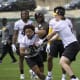 Kenny Pickett works the option during the first day of practice.